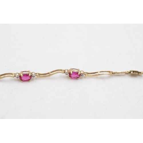 74 - 9ct gold synthetic ruby & diamond tennis bracelet (4.3g)