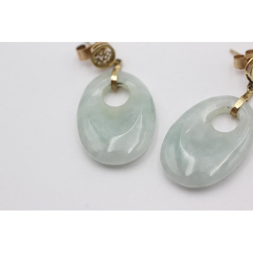 84 - 9ct gold framed jade drop earrings (7.9g)