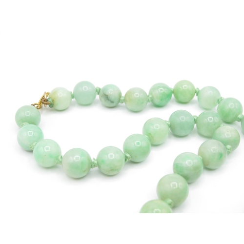 216 - 9ct gold clasped jade bead necklace (54.1g)