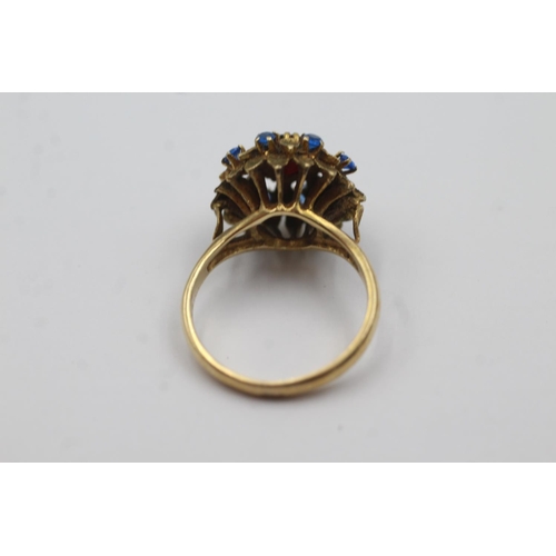 213 - 9ct gold garnet & synthetic spinel ring (3.8g)