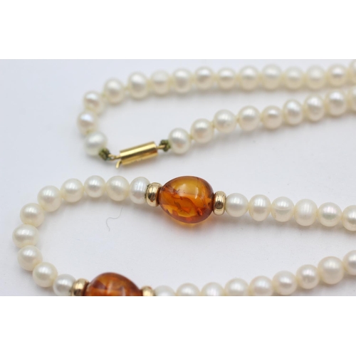 215 - 9ct gold clasped pearl & amber necklace (11.2g)