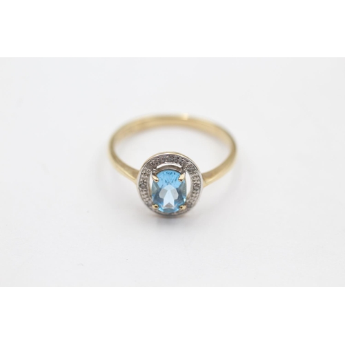 31 - 9ct gold diamond framed topaz ring (2g) size O