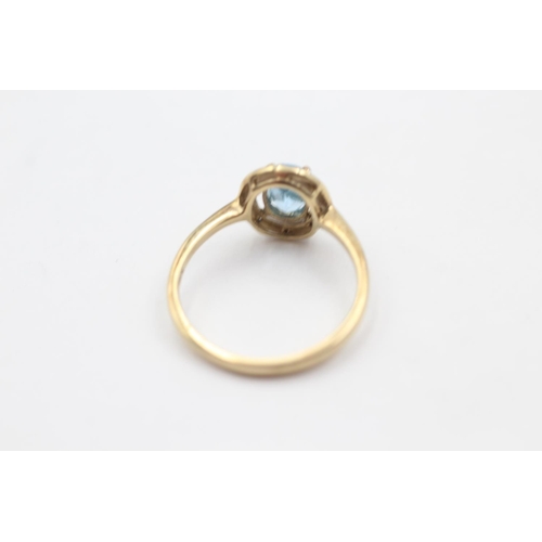 31 - 9ct gold diamond framed topaz ring (2g) size O