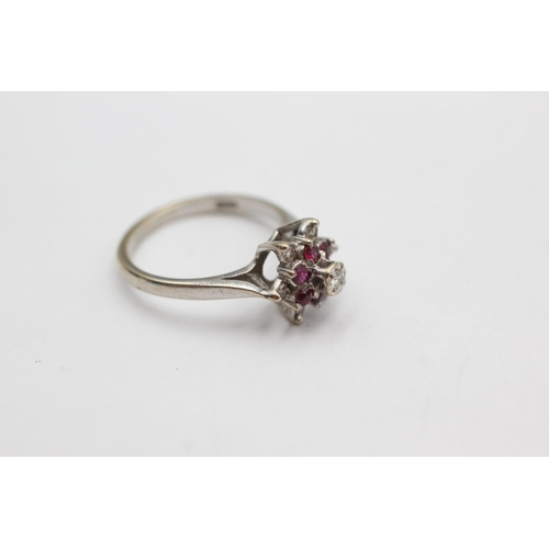 39 - 18ct white gold ruby and diamond cluster ring (3.6g) size L