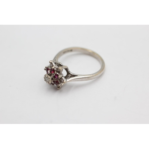 39 - 18ct white gold ruby and diamond cluster ring (3.6g) size L