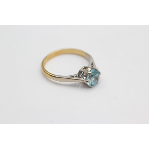 46 - 18ct gold blue zircon solitaire ring (3.4g) size N