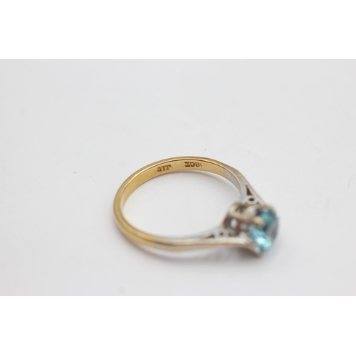 46 - 18ct gold blue zircon solitaire ring (3.4g) size N