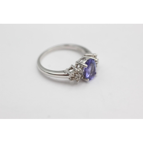 49 - 9ct white gold diamond and tanzanite ring (3.5g) size L