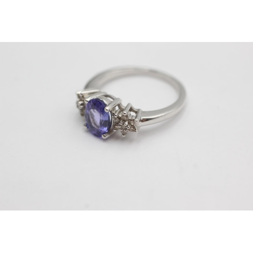 49 - 9ct white gold diamond and tanzanite ring (3.5g) size L