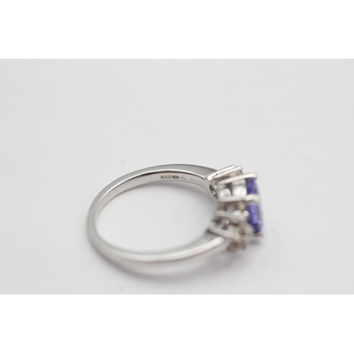 49 - 9ct white gold diamond and tanzanite ring (3.5g) size L