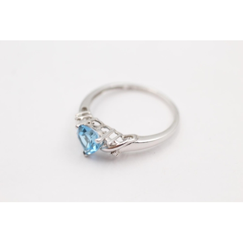 56 - 9ct white gold diamond sided topaz ring (1.9g) size P