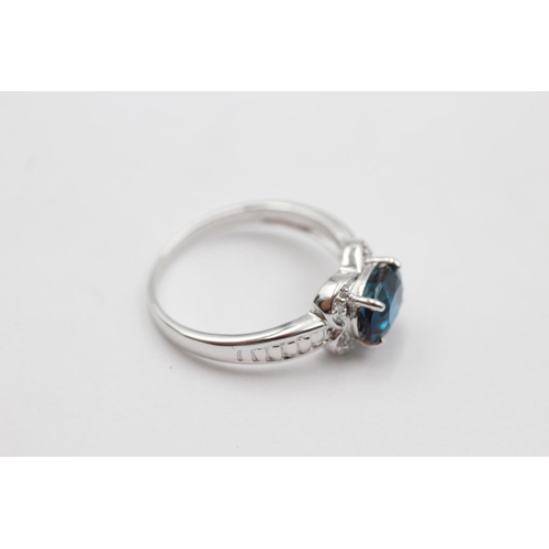 59 - 9ct white gold diamond sided topaz ring (2.8g) size O