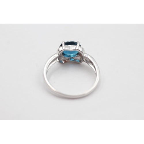 59 - 9ct white gold diamond sided topaz ring (2.8g) size O