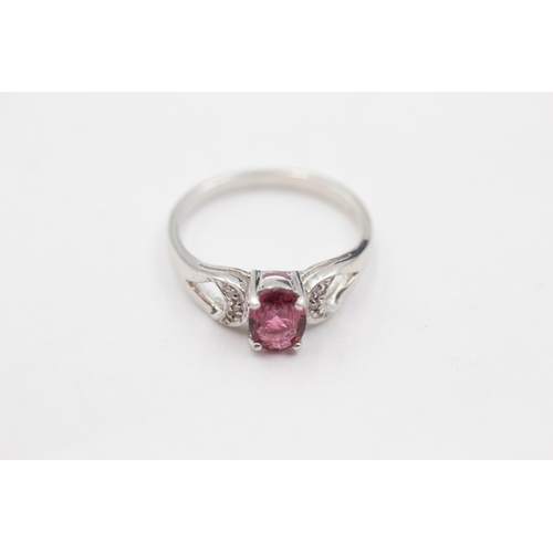 61 - 9ct white gold diamond sided tourmaline ring (2.4g) size N