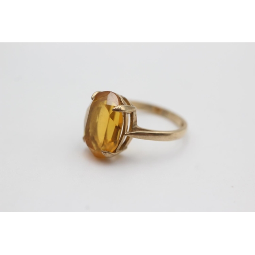 104 - 9ct gold orange paste cocktail ring (2.6g)  Size J