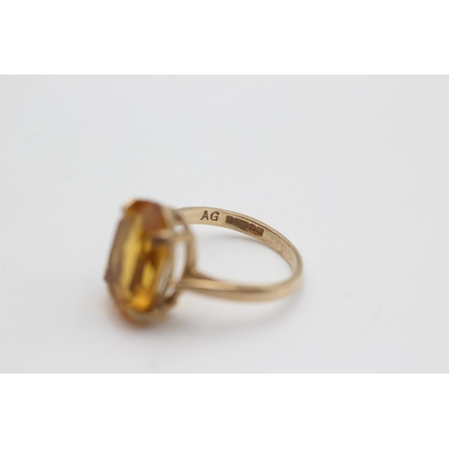 104 - 9ct gold orange paste cocktail ring (2.6g)  Size J