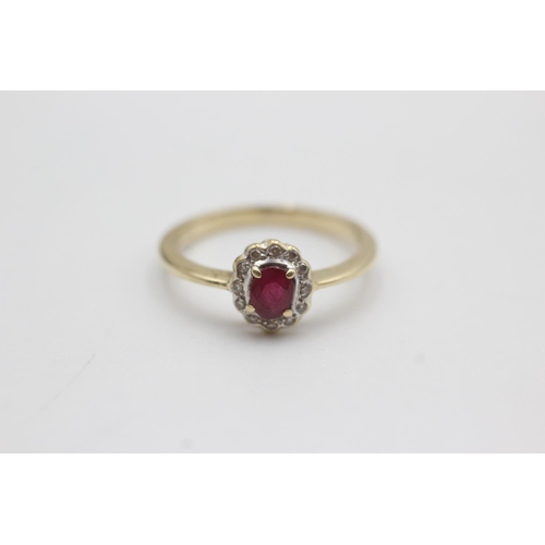 111 - 9ct gold ruby & diamond halo ring (2.1g)  Size O