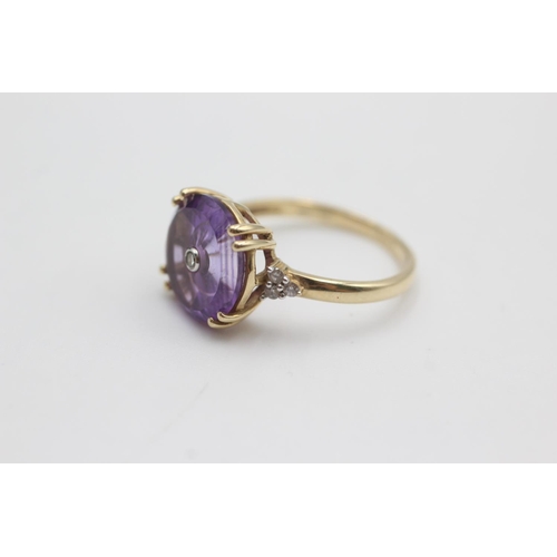 112 - 9ct gold diamond & amethyst ring (3.1g)  Size M