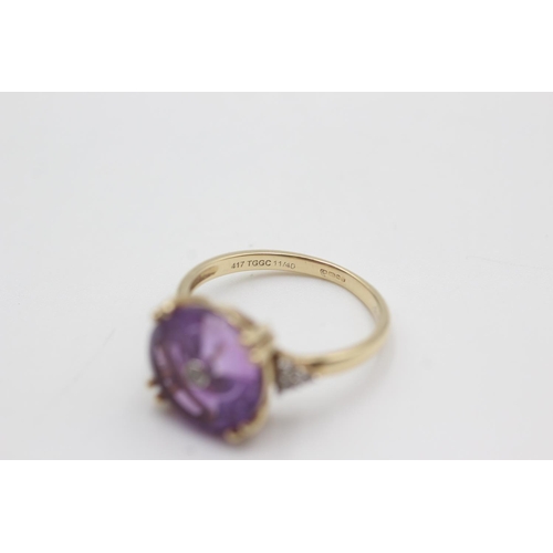 112 - 9ct gold diamond & amethyst ring (3.1g)  Size M