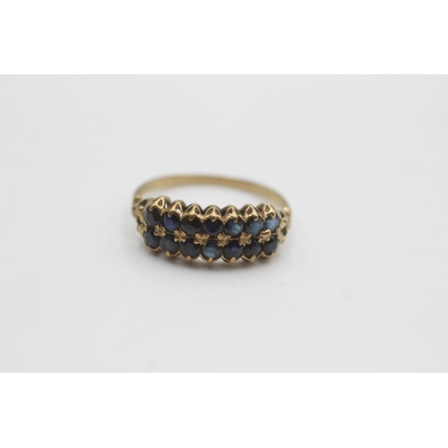 115 - 9ct gold sapphire fronted ornate framed ring (2.1g)  Size S