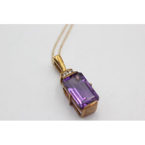 118 - 9ct gold framed amethyst pendant on chain (2.8g)