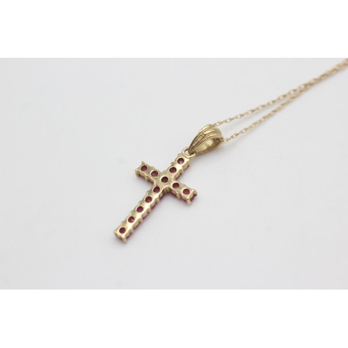 119 - 9ct gold ruby cross necklace (1.2g)