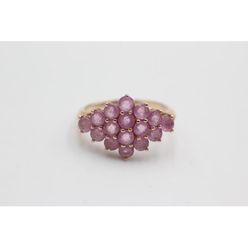 124 - 9ct rose gold pink sapphire cluster ring (3.8g)  Size S