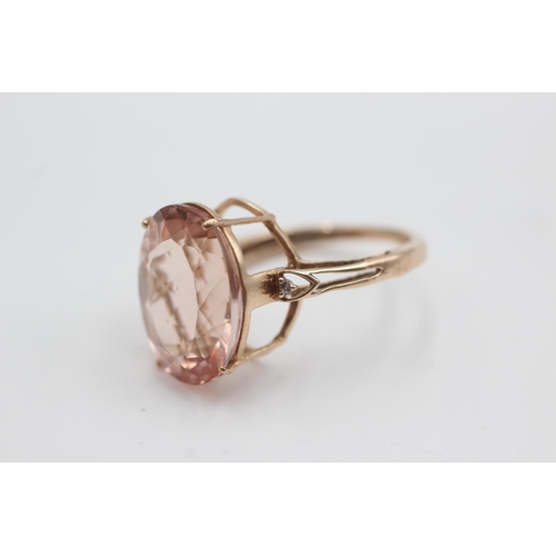 129 - 9ct rose gold diamond & rose quartz dress ring (4.1g)  Size Q