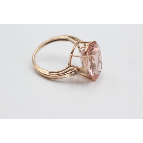 129 - 9ct rose gold diamond & rose quartz dress ring (4.1g)  Size Q