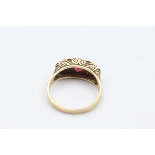 25 - 9ct gold garnet gypsy set ring (3.6g)  Size P