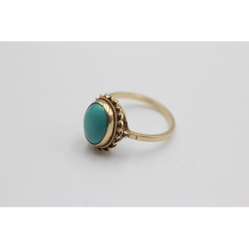 28 - 9ct gold rope framed turquoise ring (2.2g)  Size O