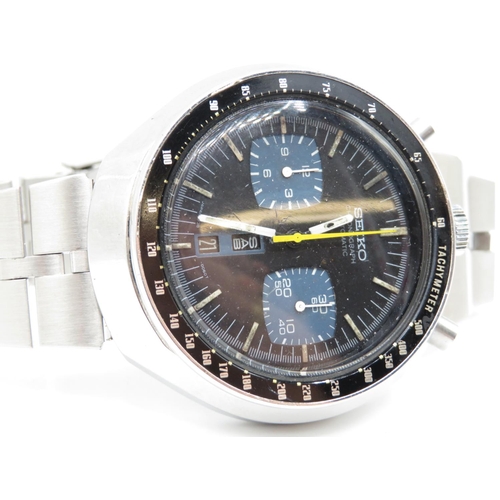 404 - original 1970's seiko bullhead chronograph watch in blue. Pushes set and stop, day date set, all wor... 