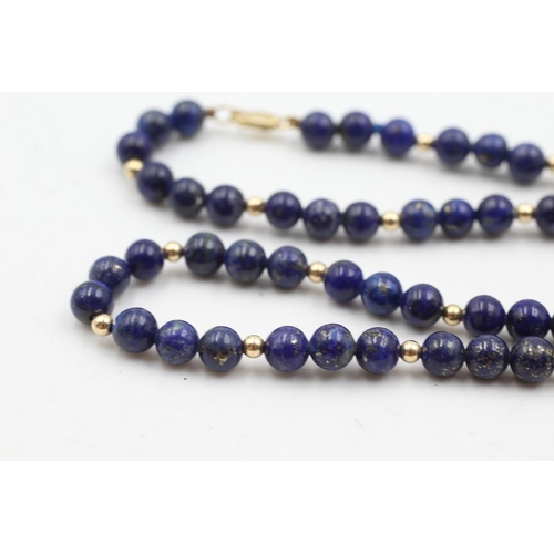 56 - 9ct gold vintage lapis lazuli polished bead necklace (23g)