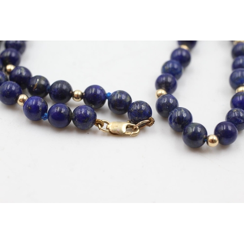 56 - 9ct gold vintage lapis lazuli polished bead necklace (23g)