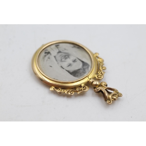 61 - 9ct gold antique photo locket (4.2g)