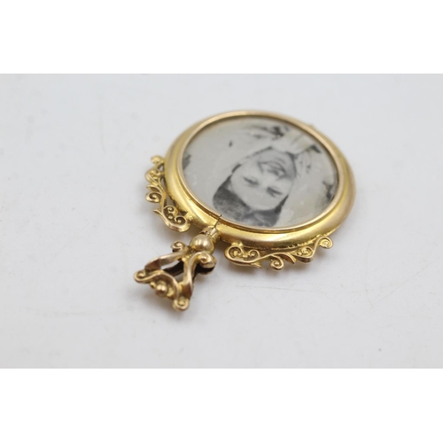 61 - 9ct gold antique photo locket (4.2g)