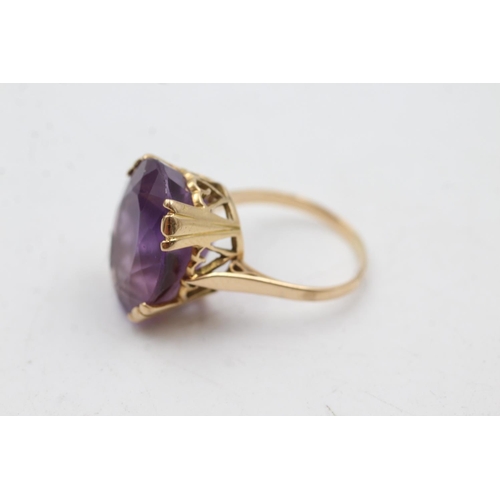 84 - 18ct gold amethyst cocktail ring (6.5g)  Size O