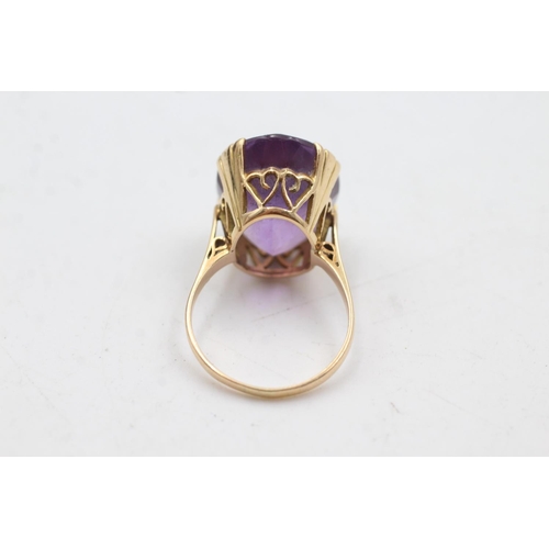 84 - 18ct gold amethyst cocktail ring (6.5g)  Size O