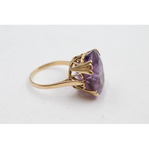 84 - 18ct gold amethyst cocktail ring (6.5g)  Size O