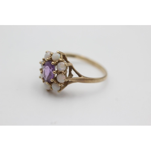 96 - 9ct gold opal framed amethyst floral set ring (2.5g)  Size P