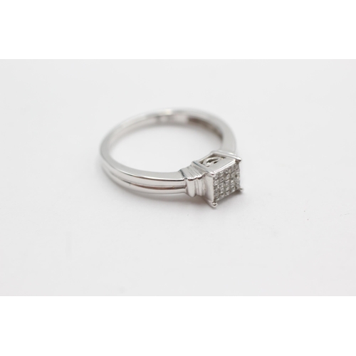 102 - 14ct white gold diamond dress ring (3.1g)  Size O