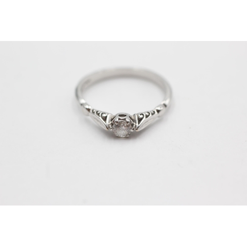 104 - 18ct white gold diamond solitaire ring (2.4g)  Size L