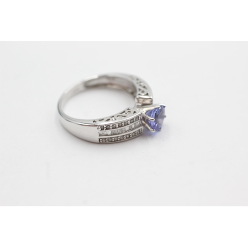 115 - 14ct white gold diamond & tanzanite dress ring (4g)  Size  N