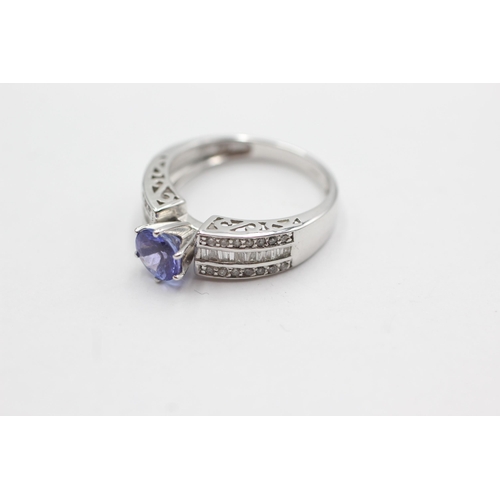 115 - 14ct white gold diamond & tanzanite dress ring (4g)  Size  N