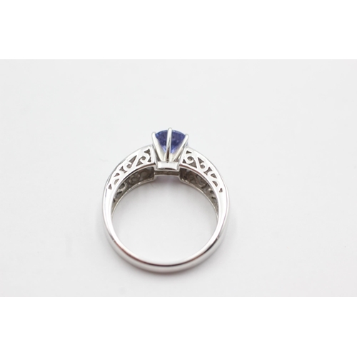 115 - 14ct white gold diamond & tanzanite dress ring (4g)  Size  N