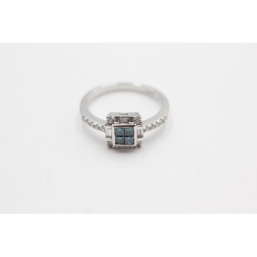 116 - 18ct white gold diamond & blue diamond ring (4.4g)  Size P