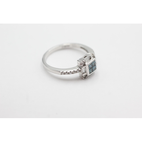 116 - 18ct white gold diamond & blue diamond ring (4.4g)  Size P