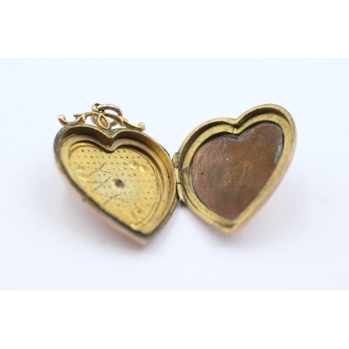 124 - 9ct gold back & front antique seed pearl & paste heart locket (6.2g)