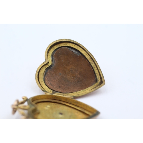 124 - 9ct gold back & front antique seed pearl & paste heart locket (6.2g)