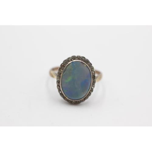 129 - 2 x 9ct gold & silver rings inc. paste, opal (6.4g)  Size  N